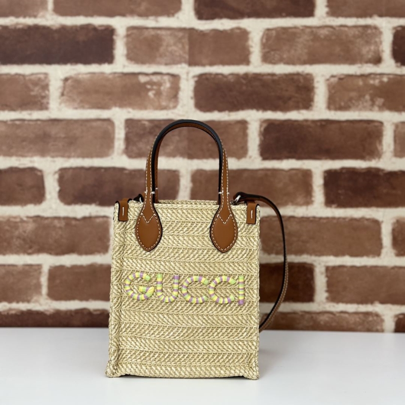 G*u*i top handle bags